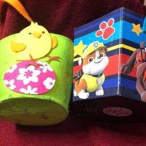 A couple of small Easter baskets, one is made of felt the other cardboard